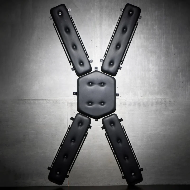 Master Series Masters St. Andrew's Cross The Masters St. Andrew’s Cross is a wall-mounted BDSM frame designed for space-saving