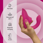 Close-up of Womanizer Blend Pleasure Air stimulation head and separate motor controls for dual stimulation