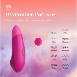Close-up of Womanizer Enhance showing broad stimulation head and separate controls for Pleasure Air and vibration motors