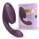 Close-up of Womanizer Next Duo showing 3D Pleasure Air head, separate controls, and features like Climax Control, Smart Silence and Afterglow