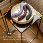 Close-up of Womanizer OG showing ergonomic curve, flexible arm and features like Smart Silence and Afterglow for discreet use