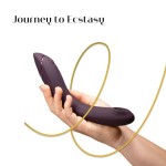Close-up of Womanizer OG showing ergonomic curve, flexible arm and features like Smart Silence and Afterglow for discreet use